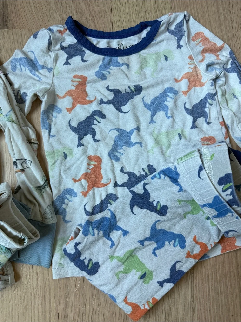Three PJ sets from Caden Lane - monsters, fish, and Dinos